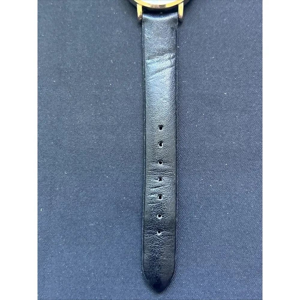 Gold Tone Pearlized Dial Black Band Women’s Quartz Watch